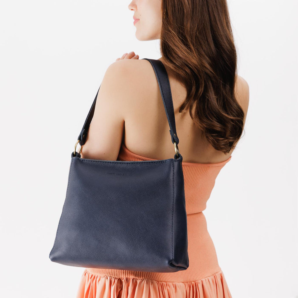 'Almost Perfect' Triangle Shoulder Bag - Famous | Online Store