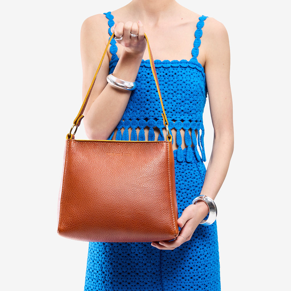 'Almost Perfect' Triangle Shoulder Bag - Famous | Online Store